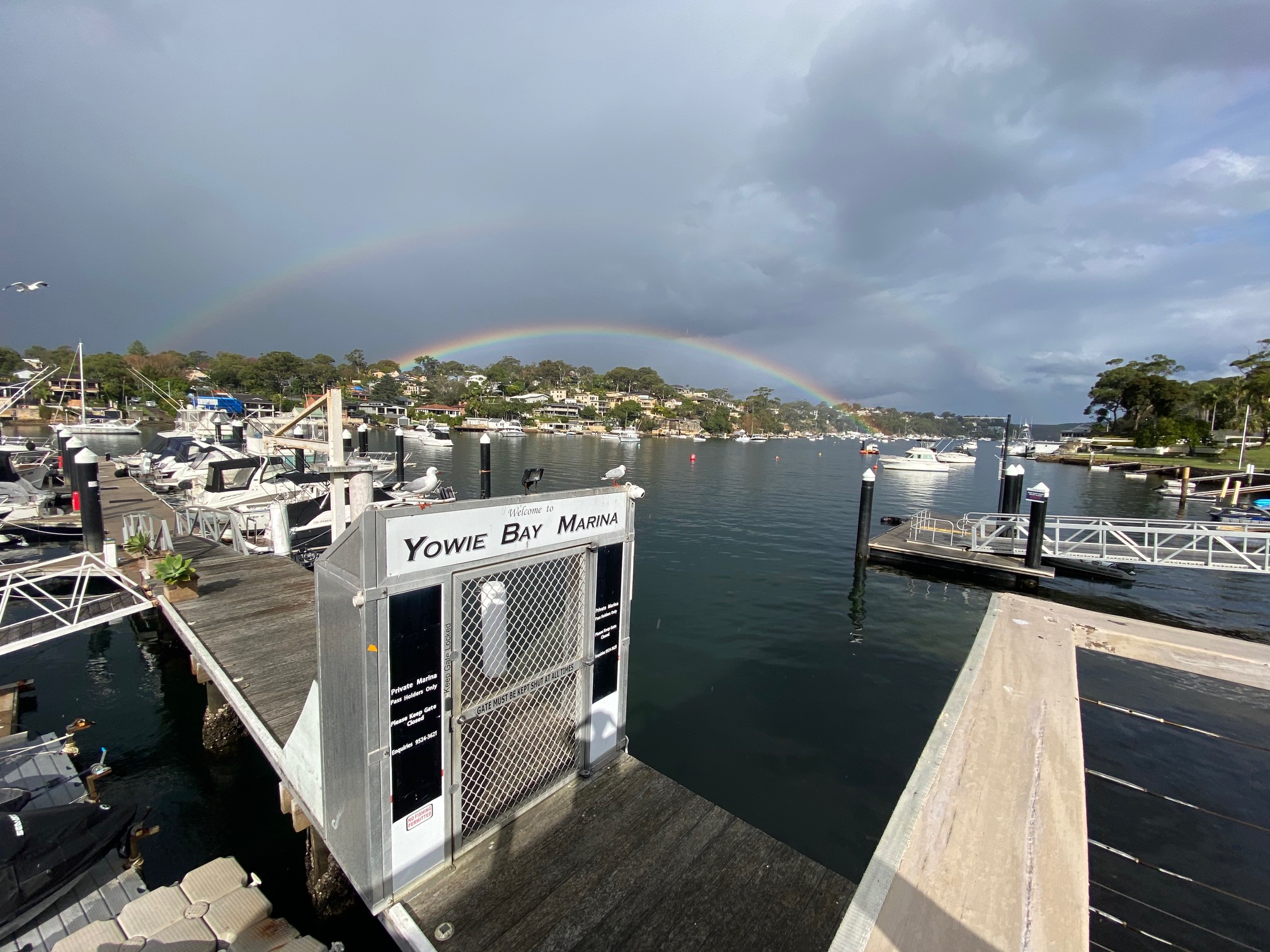Yowie Bay Marina and rainbow